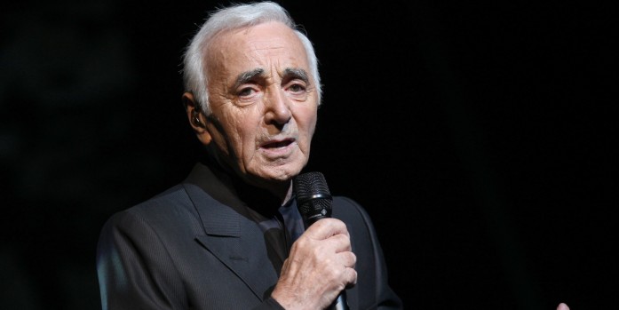 French crooner Charles Aznavour performs on stage at the Olympia concert hall in Paris on September 7, 2011 in Paris. The legendary singer-songwriter pleased fans the world over when he announced plans for a month-long residency at Paris' landmark Olympia theatre starting September 7, followed by a nationwide tour. AFP PHOTO / PIERRE VERDY