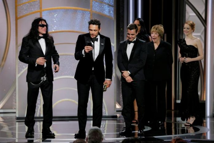 Tommy Wiseau congratulates James Franco after Franco won Best Performance by an Actor in a Motion Picture Musical or Comedy for The Disaster Artist.